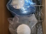 a cardboard box filled with blue and white items