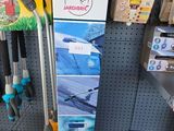 many different tools on the wall in the store