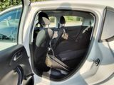 a car door open with the driver ' s seat down