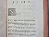 an open book with a picture of a man and a woman on it