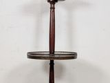 an image of a table with a lamp on top of it