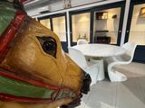 a statue of a dog with a hat on it ' s head