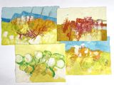 Quatre tableaux de couleurs et de formes différentes sont représentés sur une feuille de papier.