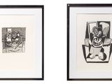 two framed black and white drawings of a man and a woman