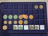 a case with a lot of coins inside of it