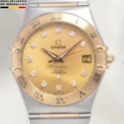une image représentant une montre en or et en argent sertie de diamants