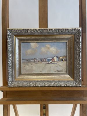 an oil painting of a beach scene with a wooden easel