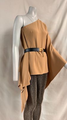 beige asymmetric top with asymmetric sleeves and belt