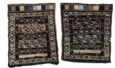 two small rugs with different designs on them