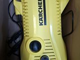 a box with a yellow pressurer in it