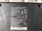 a close up of the back of a laptop with a label on it