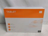 the box of the tablet is sitting on a white surface