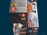 two boxes of legos that are sitting on a table