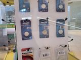 a display of batteries on display in a glass case