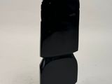 pair of black stone obelisks on a white background