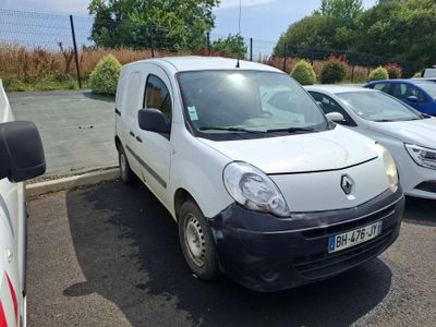 a white van that is parked in a parking lot