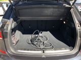 a car trunk with a bunch of wires in it