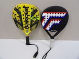 two paddles that are sitting on a table