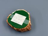 a piece of wood with a piece of paper on it