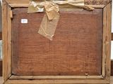 a picture of an old wooden box with a bow on it