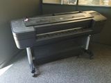 a black piano sitting in a corner in a room