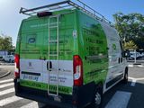 a van that is parked on the side of the road