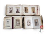 several old photos of people are displayed in a book