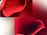 two pictures of a red bag with a zipper on it