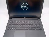 the dell laptop is open and ready to be used