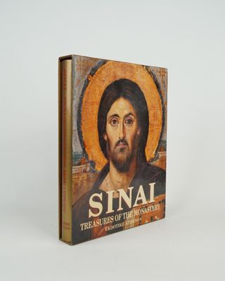 a book with a picture of jesus on the cover of it