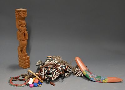 a small wooden object next to a large wooden object