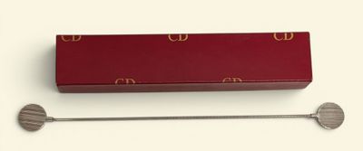 an image of a red box with a metal spoon in it