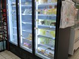a refrigerator that is in the middle of a store