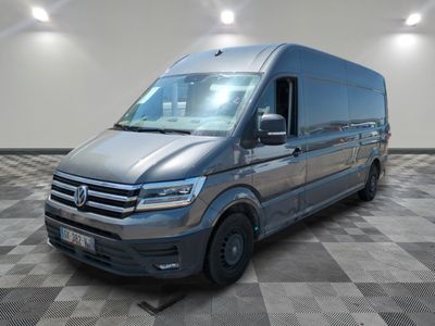 the new volkswagen van is parked in a large room