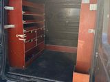 an image of a van with the door open