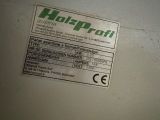 a label on the back of a machine that says hold - off