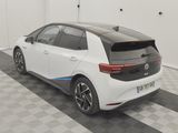 a white car that is parked in a garage