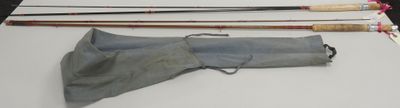 many different types of fishing rods on the table