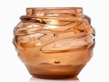 an image of a glass vase on a white surface