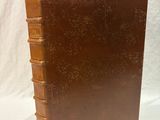 brown leather bound book on a white background with a white background