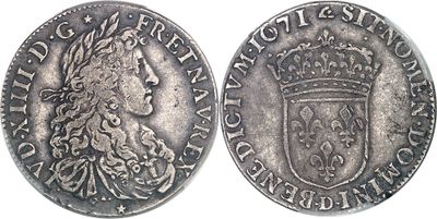 une pièce d'argent surmontée d'une couronne