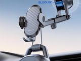 a close up of a cell phone holder on a car dashboard