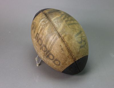 a ball with writing on it sitting on a table