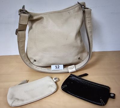 two purses that are sitting on a table