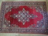 an oriental rug on the floor in a room