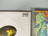 two books that are sitting next to each other on a table
