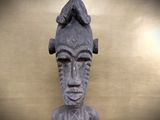 an image of a statue of a man with a hat on it ' s head
