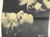 an old movie poster of a man and a woman laying on a bed