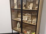 a display case with a lot of items inside of it
