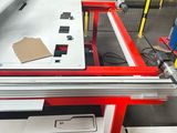 a machine that is sitting on a table in a factory